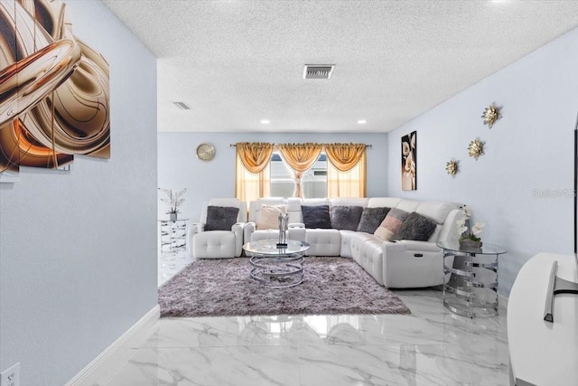 14506 Sutter Pl, Tampa, FL 33625 - living room featuring a textured ceiling, marble finish floors, and baseboards