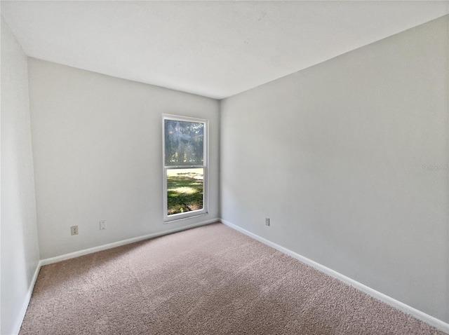 13794 SW 112th St, Dunnellon, FL 34432 - carpeted spare room featuring baseboards
