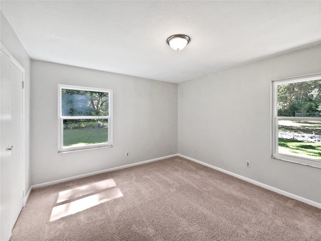 13794 SW 112th St, Dunnellon, FL 34432 - carpeted empty room featuring baseboards