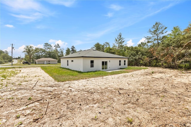 17762 SW 33rd Ter, Ocala, FL 34473 - view of property exterior featuring stucco siding