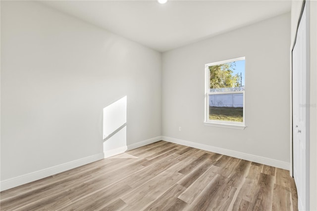17762 SW 33rd Ter, Ocala, FL 34473 - unfurnished room with light wood-type flooring and baseboards