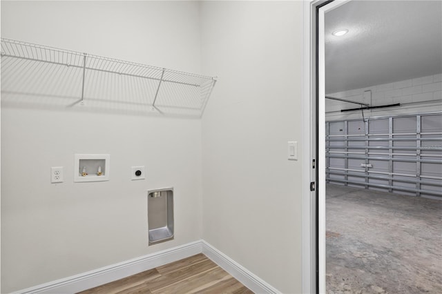 17762 SW 33rd Ter, Ocala, FL 34473 - laundry room featuring hookup for an electric dryer, hookup for a washing machine, and baseboards