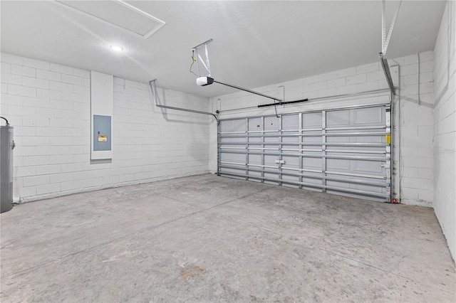 17762 SW 33rd Ter, Ocala, FL 34473 - garage featuring electric panel, concrete block wall, and a garage door opener