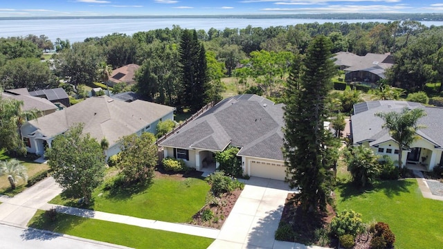 13631 Via Roma Cir, Clermont, FL 34711 - aerial view of residential area with a nearby body of water