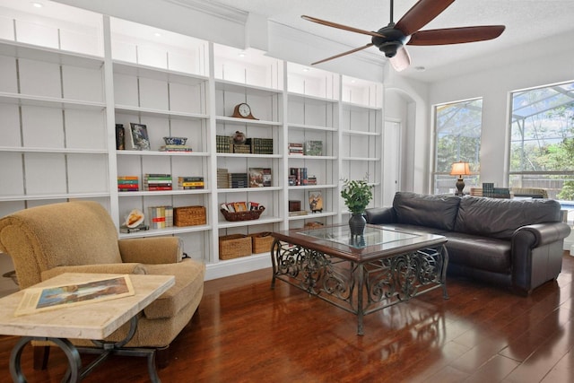 13631 Via Roma Cir, Clermont, FL 34711 - living room featuring wood finished floors, ceiling fan, and arched walkways