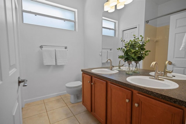13631 Via Roma Cir, Clermont, FL 34711 - bathroom featuring double vanity, a shower, and tile patterned floors