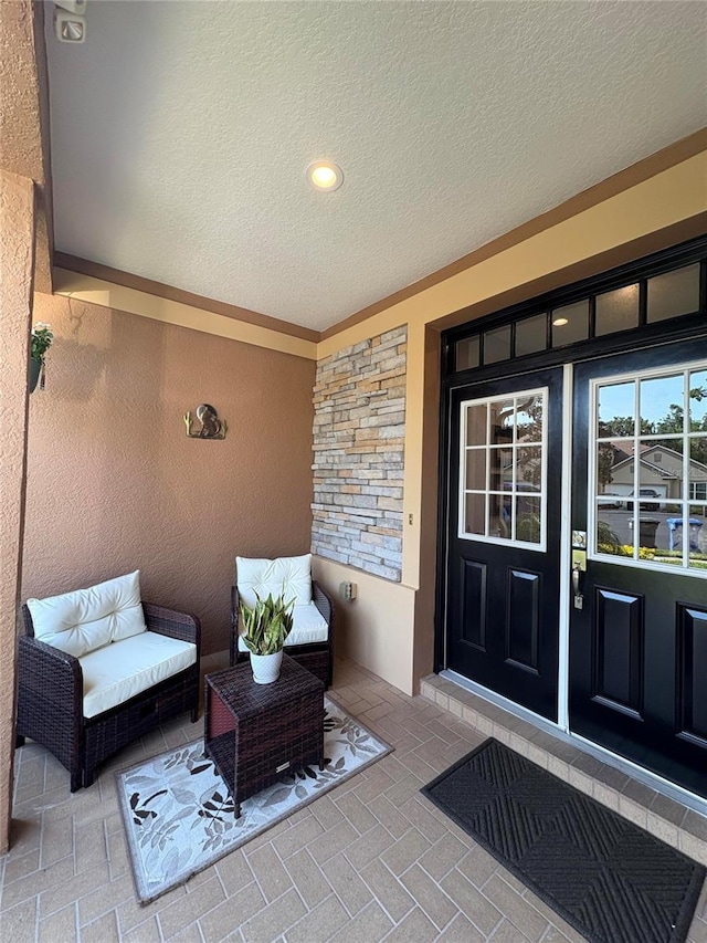 1212 Georgia Trace Ave, Valrico, FL 33596 - doorway to property with stucco siding and stone siding