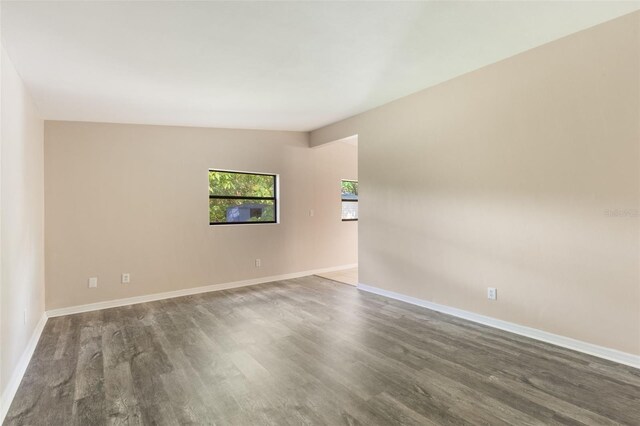 212 Homewood Dr, Sanford, FL 32773 - spare room featuring wood finished floors and baseboards
