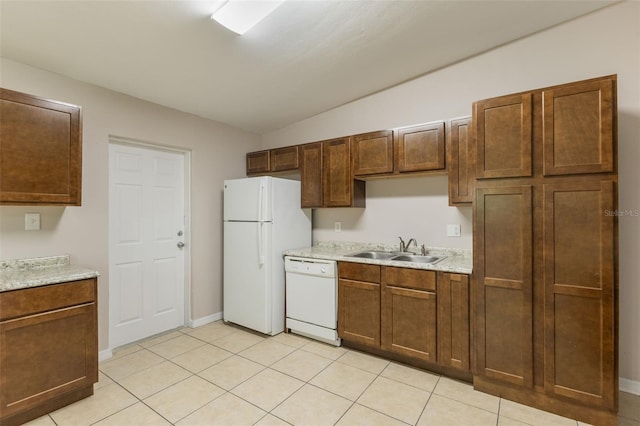 212 Homewood Dr, Sanford, FL 32773 - kitchen with white appliances and light tile patterned flooring