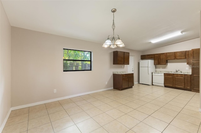 212 Homewood Dr, Sanford, FL 32773 - kitchen with white appliances, light countertops, a chandelier, and hanging light fixtures