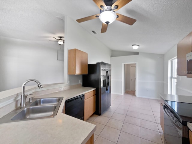 612 Doe Cove Pl, Apopka, FL 32703 - kitchen featuring black appliances, a sink, lofted ceiling, light countertops, and ceiling fan