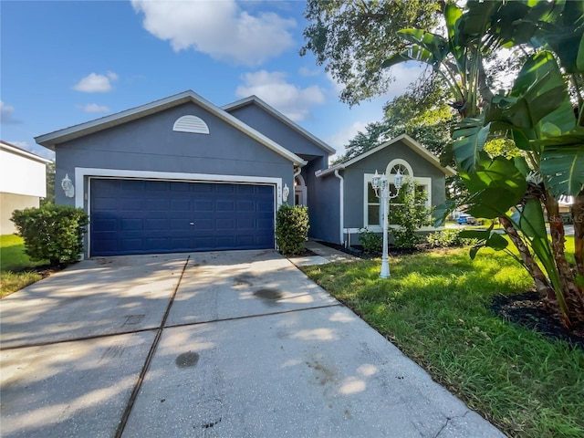612 Doe Cove Pl, Apopka, FL 32703 - ranch-style home featuring stucco siding, driveway, and a garage