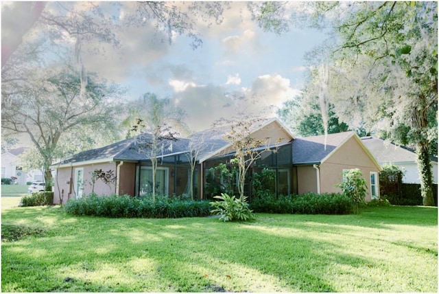 2102 Applegate Dr, Ocoee, FL 34761 - view of front of house featuring a front lawn and stucco siding