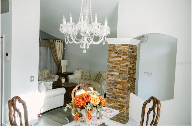 2102 Applegate Dr, Ocoee, FL 34761 - dining area featuring a chandelier and arched walkways