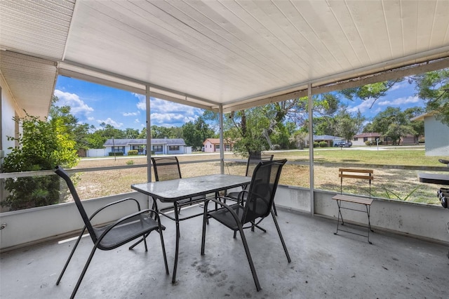 1198 E Hancock Dr, Deltona, FL 32725 - sunroom / solarium featuring outdoor dining space