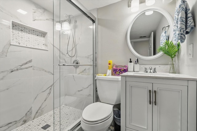 704 Honeysuckle Ave, Kissimmee, FL 34747 - full bathroom featuring a marble finish shower, toilet, and vanity