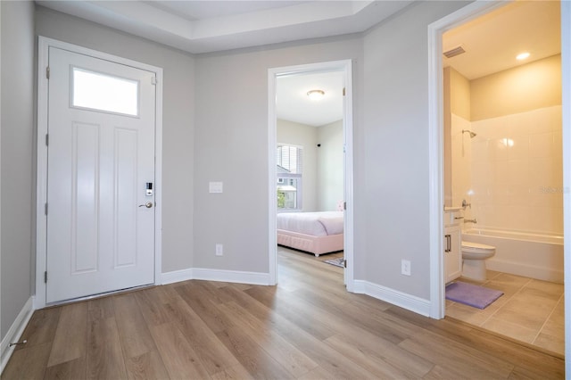16489 Silver Brook Way, Winter Garden, FL 34787 - foyer featuring wood finished floors and baseboards