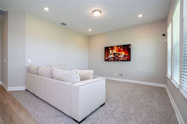 16489 Silver Brook Way, Winter Garden, FL 34787 - living area featuring recessed lighting, baseboards, and wood finished floors