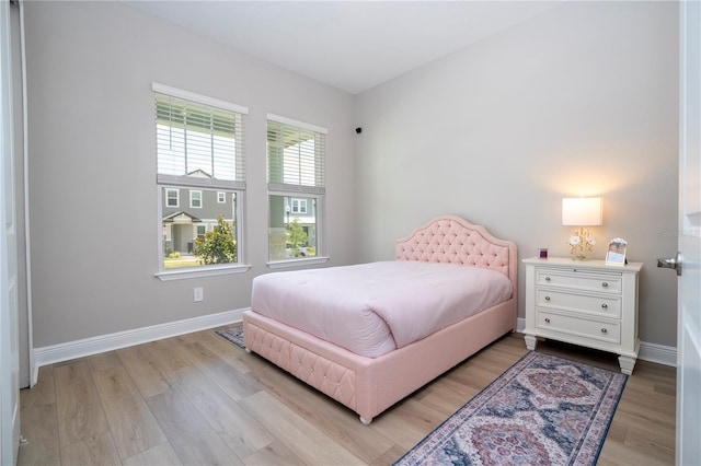 16489 Silver Brook Way, Winter Garden, FL 34787 - bedroom featuring light wood-type flooring and baseboards