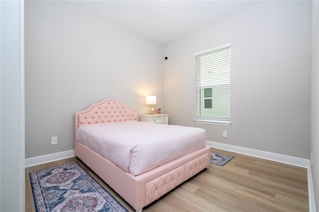16489 Silver Brook Way, Winter Garden, FL 34787 - bedroom with light wood finished floors and baseboards