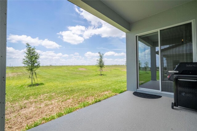 16489 Silver Brook Way, Winter Garden, FL 34787 - view of green lawn featuring a patio area and a view of rural / pastoral area