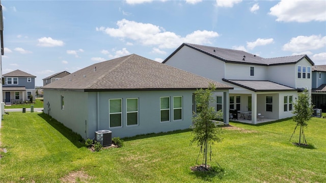 16489 Silver Brook Way, Winter Garden, FL 34787 - back of house featuring a patio area, a yard, and stucco siding
