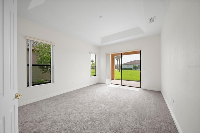 453 Sorrento Rd, Kissimmee, FL 34759 - empty room featuring plenty of natural light, carpet floors, and baseboards