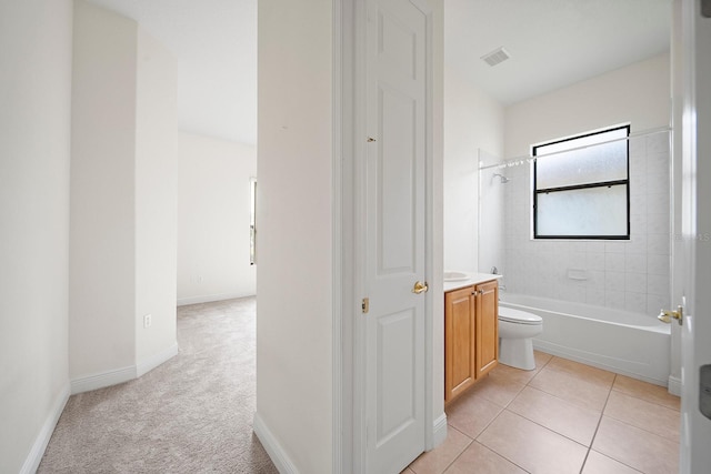 453 Sorrento Rd, Kissimmee, FL 34759 - full bathroom featuring vanity, toilet,  shower combination, and baseboards