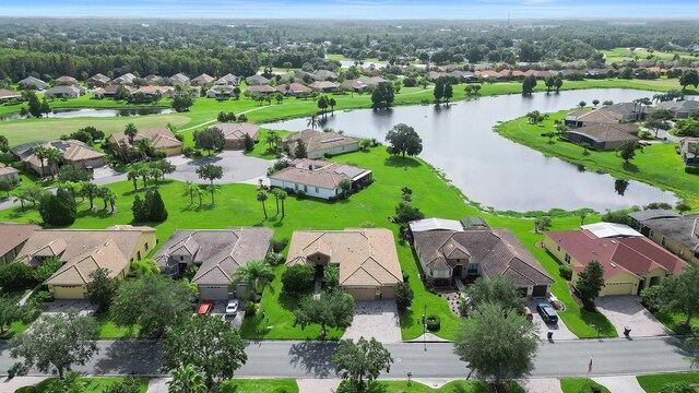453 Sorrento Rd, Kissimmee, FL 34759 - aerial view of residential area featuring a large body of water and a local golf course