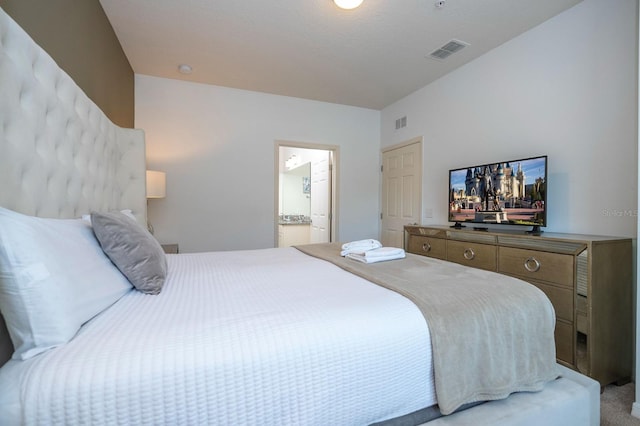 3229 Cupid Pl, Kissimmee, FL 34747 - bedroom featuring light colored carpet and ensuite bathroom