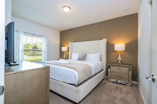 3229 Cupid Pl, Kissimmee, FL 34747 - bedroom featuring light colored carpet and baseboards