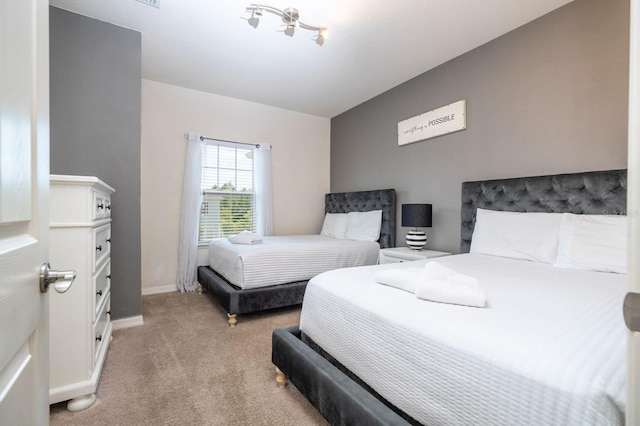 3229 Cupid Pl, Kissimmee, FL 34747 - bedroom with light carpet and baseboards