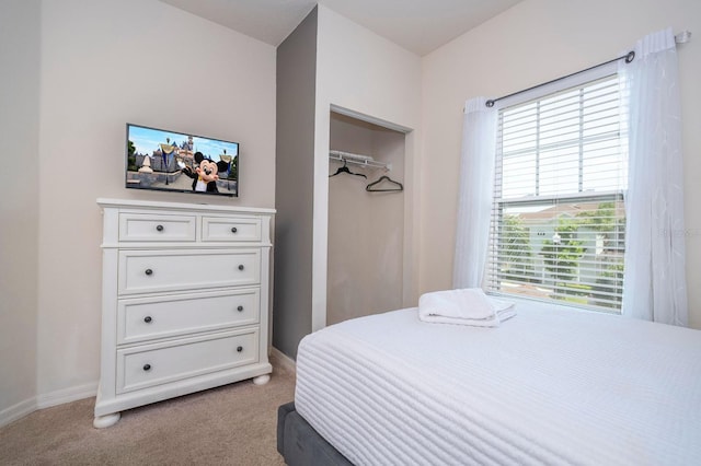 3229 Cupid Pl, Kissimmee, FL 34747 - bedroom with multiple windows, light carpet, and baseboards