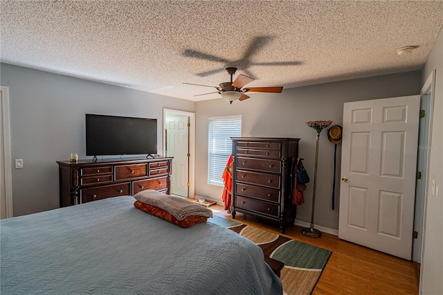 46 Frenora Ln, Palm Coast, FL 32137 - bedroom with wood finished floors and a ceiling fan