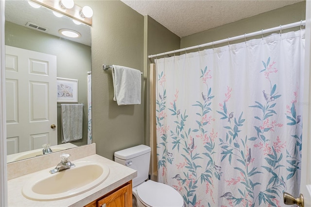 46 Frenora Ln, Palm Coast, FL 32137 - full bath featuring vanity, toilet, a textured ceiling, and curtained shower