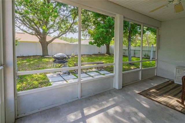 46 Frenora Ln, Palm Coast, FL 32137 - unfurnished sunroom featuring ceiling fan