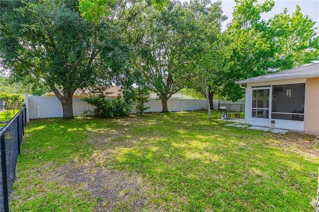 46 Frenora Ln, Palm Coast, FL 32137 - view of yard with a sunroom