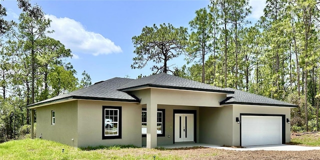 9335 N Fairy Lilly Dr, Citrus Springs, FL 34433 - prairie-style house with a garage, stucco siding, a shingled roof, and driveway