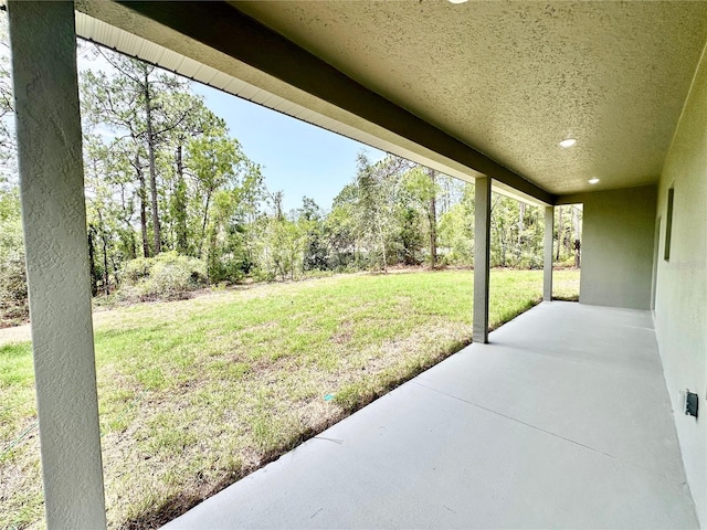 9335 N Fairy Lilly Dr, Citrus Springs, FL 34433 - view of grassy yard featuring a patio