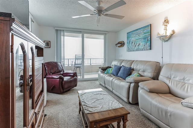 3360 Ocean Shore Blvd Unit 4050, Ormond Beach, FL 32176 - living room featuring light carpet, a textured ceiling, and ceiling fan