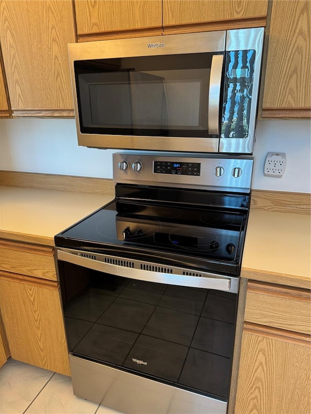 3360 Ocean Shore Blvd Unit 4050, Ormond Beach, FL 32176 - kitchen view of appliances with stainless steel finishes and light countertops