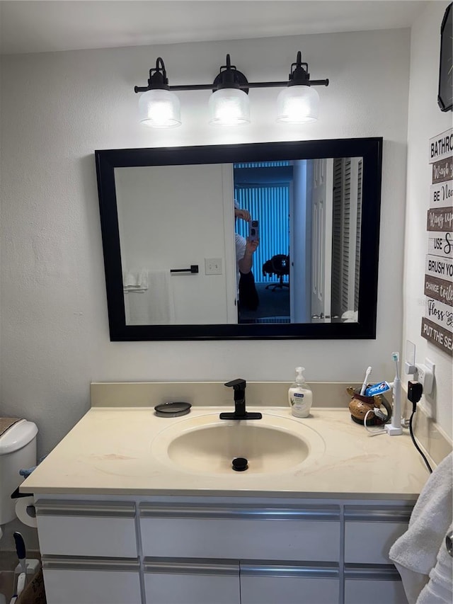 3360 Ocean Shore Blvd Unit 4050, Ormond Beach, FL 32176 - bathroom featuring vanity and toilet