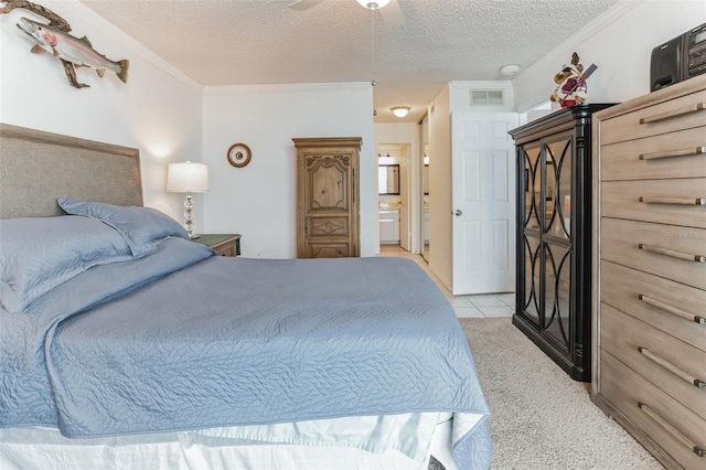 3360 Ocean Shore Blvd Unit 4050, Ormond Beach, FL 32176 - bedroom with light carpet, a textured ceiling, crown molding, and connected bathroom