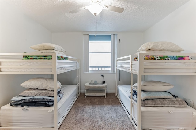 3360 Ocean Shore Blvd Unit 4050, Ormond Beach, FL 32176 - bedroom with a textured ceiling, carpet, and a ceiling fan