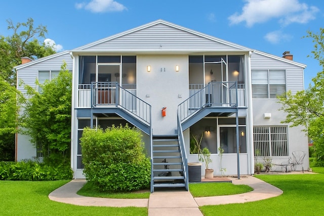 1108 Northlake Dr Unit 1108, Sanford, FL 32773 - view of property with stairway and central AC unit