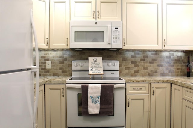 1108 Northlake Dr Unit 1108, Sanford, FL 32773 - kitchen with white appliances, light countertops, and decorative backsplash