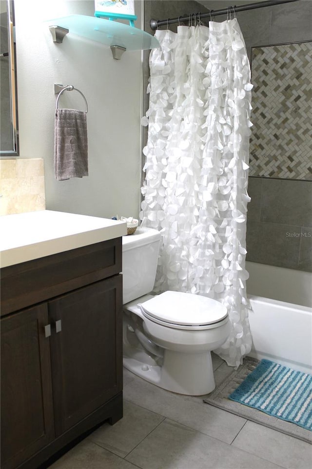 1108 Northlake Dr Unit 1108, Sanford, FL 32773 - bathroom with toilet, vanity, shower / bath combination with curtain, and tile patterned floors