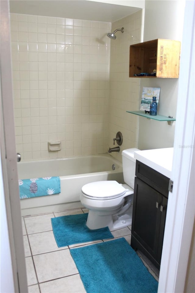 1108 Northlake Dr Unit 1108, Sanford, FL 32773 - bathroom featuring tile patterned flooring, vanity, toilet, and bathtub / shower combination