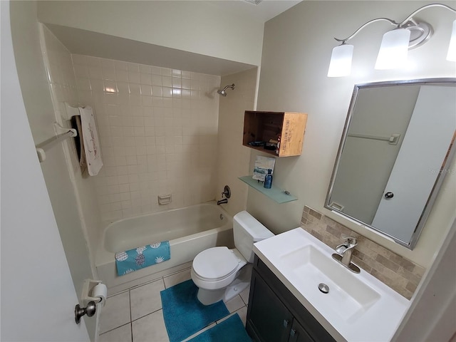 1108 Northlake Dr Unit 1108, Sanford, FL 32773 - full bathroom with toilet, vanity, tub / shower combination, tile patterned flooring, and decorative backsplash