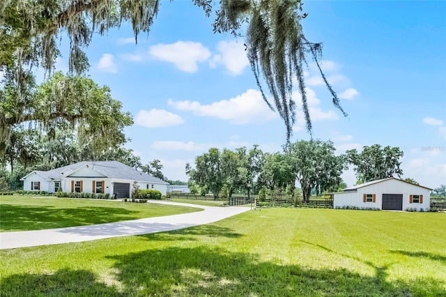 5478 NW 153rd Ct, Morriston, FL 32668 - view of yard featuring a garage